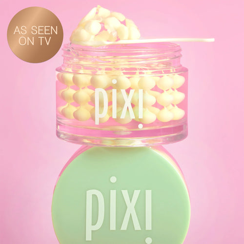 Pixi Vitamin-C CreamSerum product with pink lid and green cap on a pink background and a "As Seen on TV" badge view 2