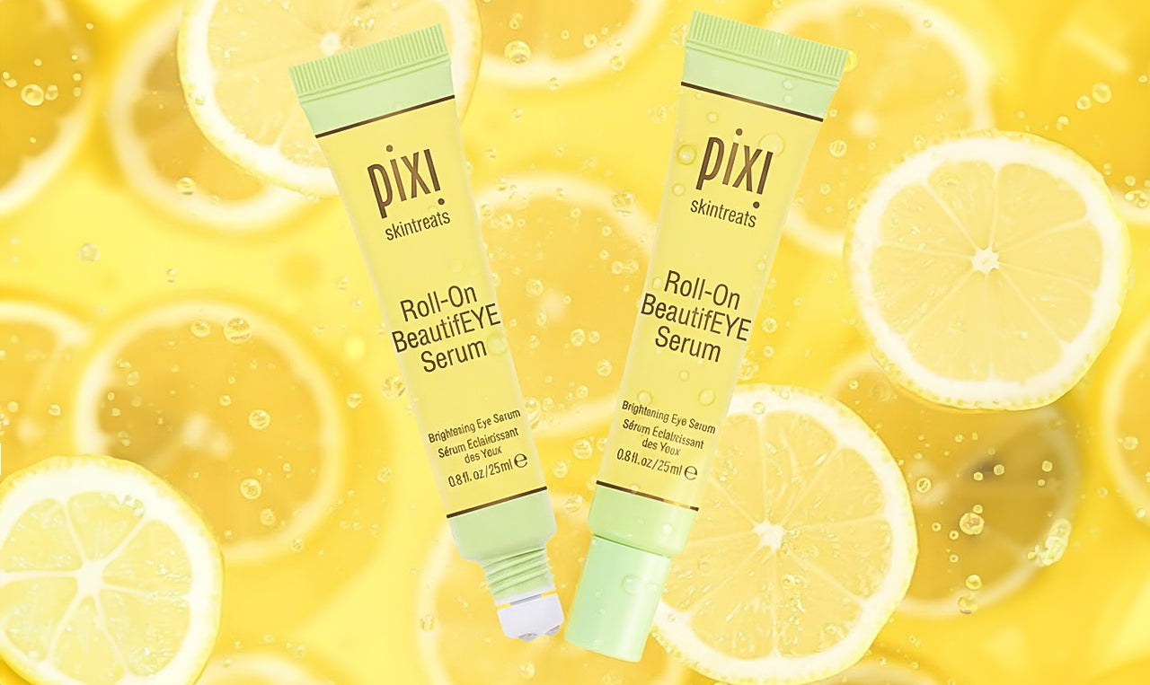 Roll-On Beautifeye Serum with lemons in the background